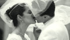 black and white bride and groom kissing